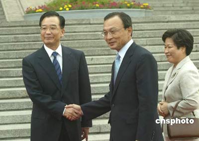 温家宝会见韩国总理 呼吁尽早建立中韩自贸区