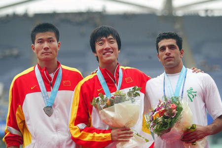 图片:刘翔称雄亚锦赛男子110米栏 打破记录