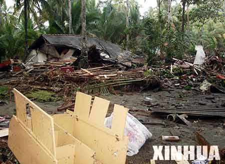 图文：一座房屋被地震引发的海啸摧毁
