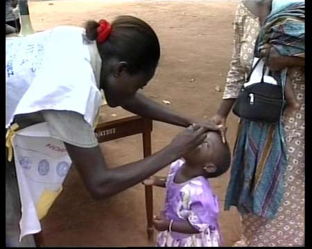 明:十年抗疟在非洲