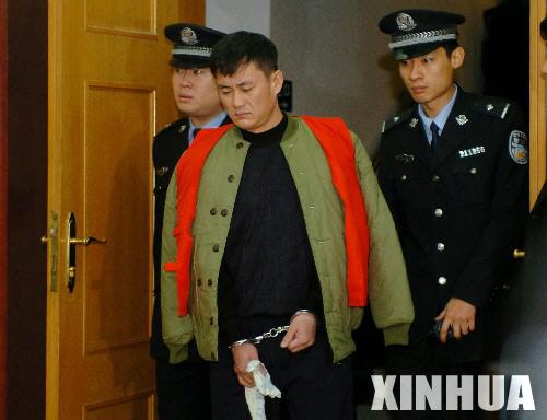 沈阳爆炸抢劫运钞车主犯被判死刑立即执行(组图)