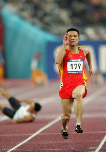 图文:亚运会男子100米预赛 温永毅在比赛中