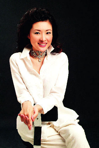 妈咪佳人 名人育儿       2006年5月,周涛离开中央电视台到北京奥组委