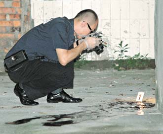 台湾吴善九命案凶嫌蓝家伟与警方枪战后自尽图