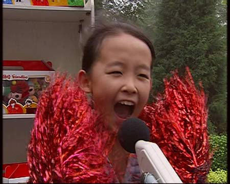 图文：奥运助威团高声呐喊 助威口号中国队加油