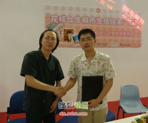 重庆出版集团邹禾与姚签订战略协议