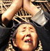 甘肃省文县城关镇元茨头村的一位受灾村民用当地习俗为汶川大地震遇难者祈福