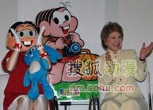 巴西旅游部长同卡通形象在一起
