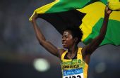 图文：女子400米栏牙买加选手夺金 批国旗出场