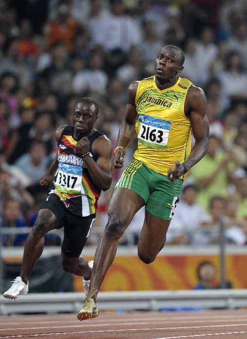 图文:博尔特获得男子200米金牌 博尔特比赛中-搜狐2008奥运