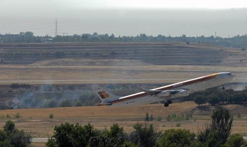马德里机场空难致153人丧生 西班牙国悼3天