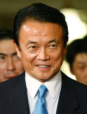 日本首相麻生太郎承认家族企业曾奴役战俘(图
