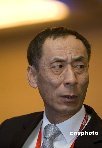 资料图:招商局董事长兼招商银行董事长秦晓 中新社发 王辰 摄