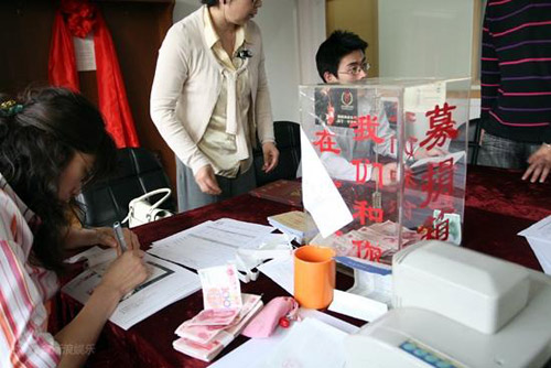 中国扶贫基金会王毅:第一个报名值守热线电话