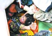 印尼震区奇迹：废墟下发出短信 8人仍可能生还