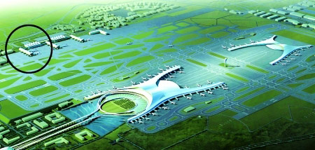 重庆江北国际机场航站楼鸟瞰图,图示处为在建的t2a航站楼效果图