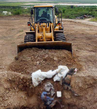 海地遇难者遗体被扔到诅咒之地 群葬坑(图)