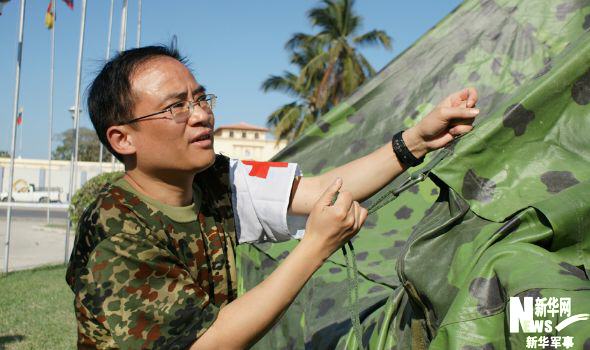 中国医疗防疫救护队经历人蚊大战考验(组图)