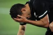 幻灯：新西兰三连平遗憾出局 球员失望抱头痛哭