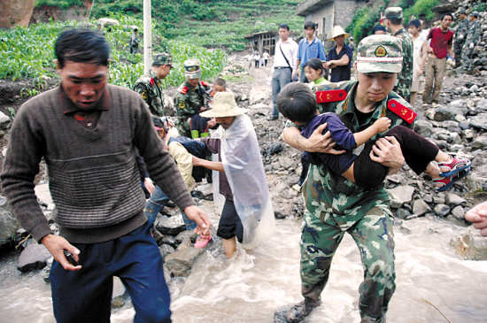 关岭多少人口_Death Toll Rises to 26 in SW China Landslide img src