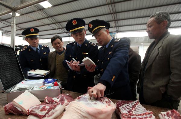 中国政府彻查瘦肉精事件力避行业危机(组图