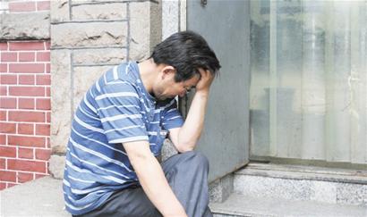 痛失爱子 痛不欲生(图)