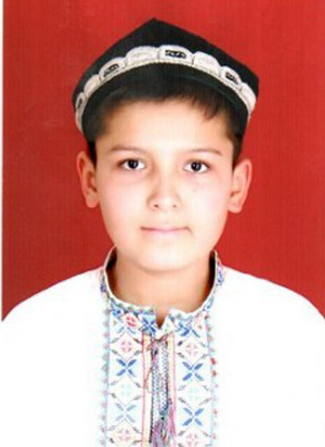 阿不都沙拉木·阿不力肯木,维族,11岁,来自喀什