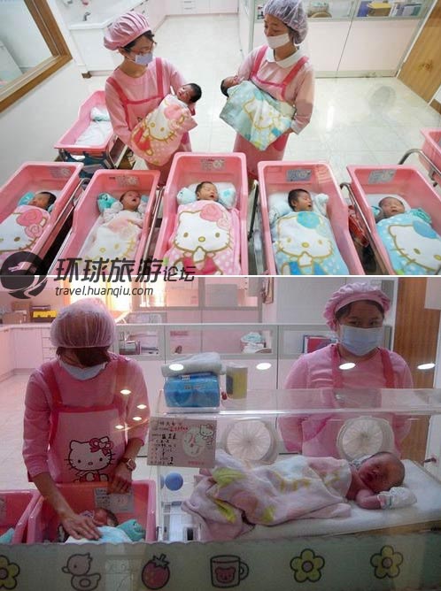 kitty妇幼医院,大厅门口立着一个穿粉色护士服的kitty,手里抱着小婴儿