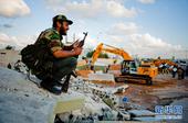 利比亚当局武装人员开始拆除阿齐齐亚兵营(图)