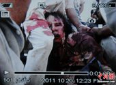 卡扎菲据传已因伤身亡 “被俘”照片公布(图)