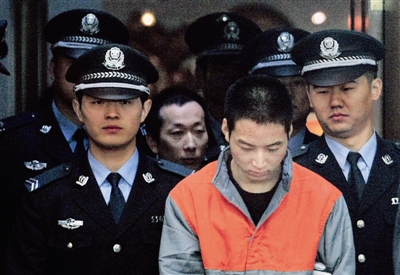 庭审中第一被告人刘建国低头认可全部指控,称作案的目的就是"抓人要钱