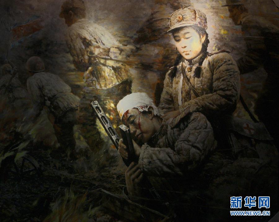 12月25日在深圳拍摄的朝鲜油画作品。 新华社发张长江