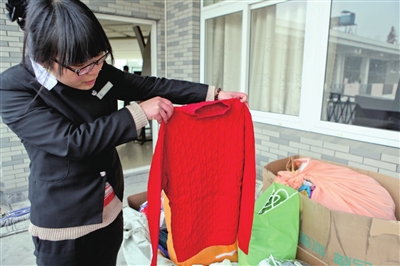 捐赠衣物温暖贫困地区市民在行动(图)
