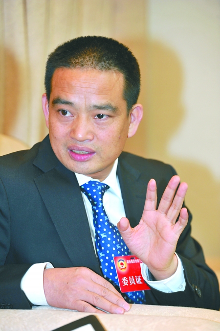 市政协委员,重庆华林印务有限公司董事长徐在华 记者 张路桥 摄