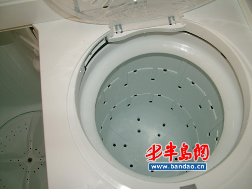 全新洗衣机挂满水珠 国美被指卖返修机(图)