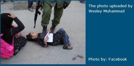 网传以色列士兵脚踩女童用枪指其头部照片(组