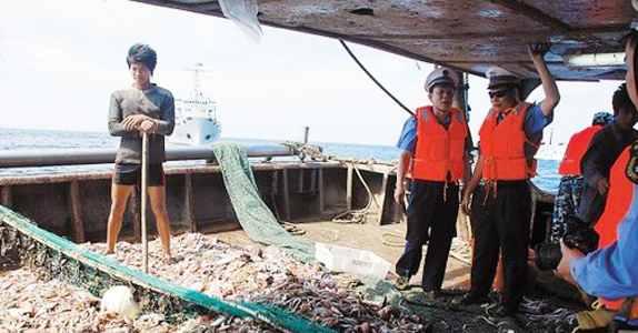 中国逾95%领证渔船撤出南沙:担心外国炮艇抓