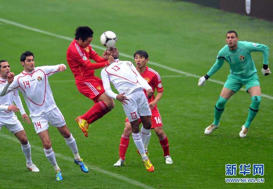中国男足胜利告别2014年世界杯_首页小图