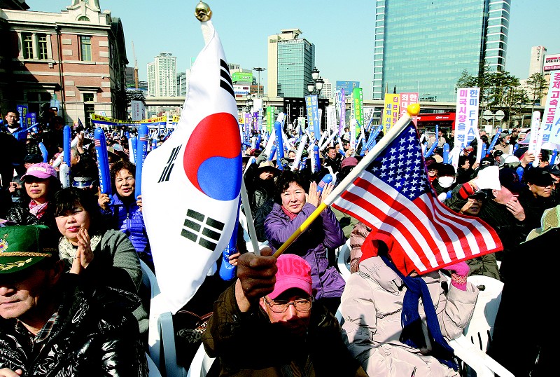 韩美自由贸易协定生效(图)