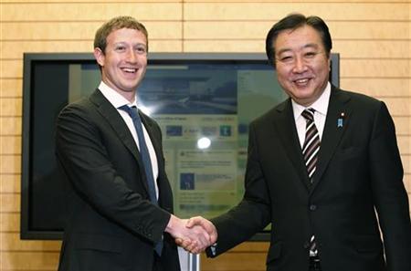 Facebook的CEO马克・扎克伯格与日本首相野田佳彦。图片来源路透社