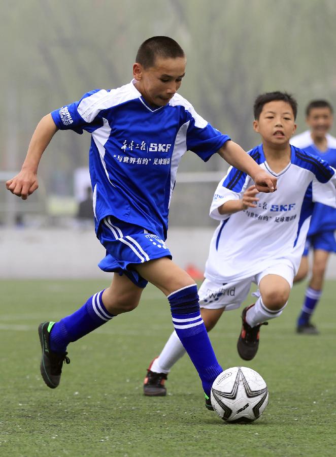 足球--“与世界有约”希望工程青少年足球邀请赛在京开赛(组图)-搜狐滚动