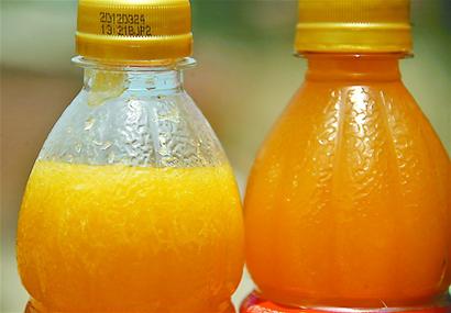 美汁源果粒橙一摇变果皮橙 可口可乐称非假冒