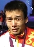 赛后,吴景彪最后一道心理防线被冲破,失声痛哭起来。