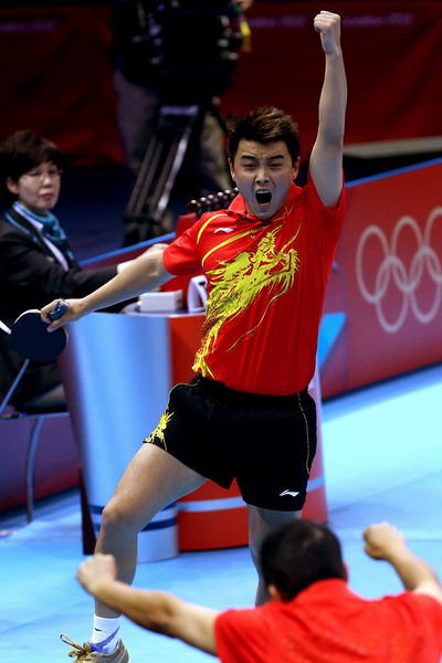 奥运图:中国男乒力克德国晋级 高兴地跳起来