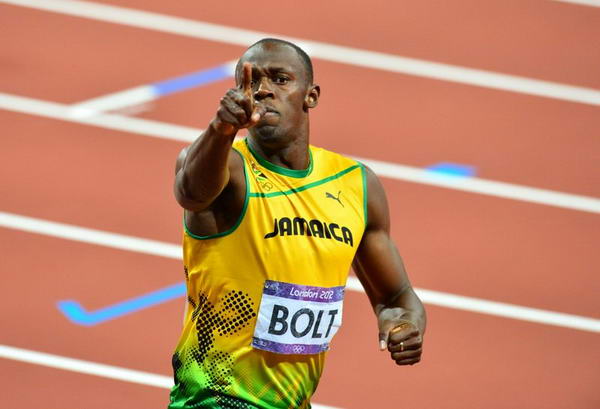 奥运图:男子200米博尔特卫冕 向看台伸出手指