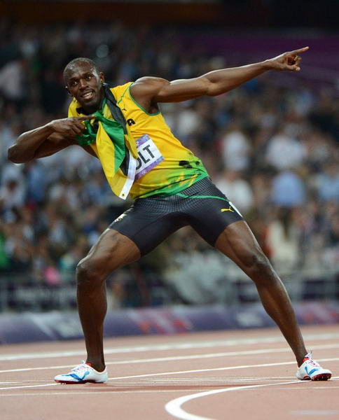 奥运图:男子200米博尔特卫冕 标志动作