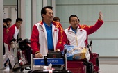 奥运图：中国乒乓球队载誉回国 刘国梁