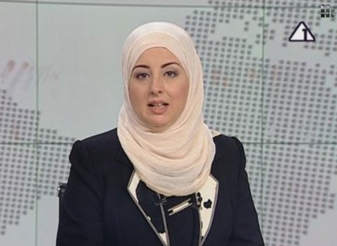 埃及国家电视台首现头巾女主播(图)