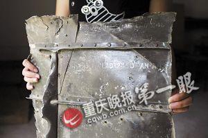 重庆万州渔民打捞飞虎队轰炸机残骸 将修复展