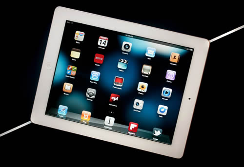 你买哪个:微软Surface?苹果iPad?-搜狐IT